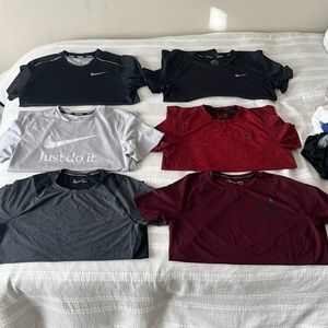 14 workout shirts all size large and in good condition some have never been worn
